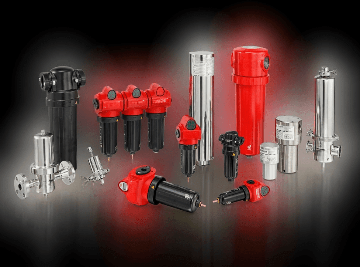 Assorted industrial filters in black, red, and silver on a dark background.